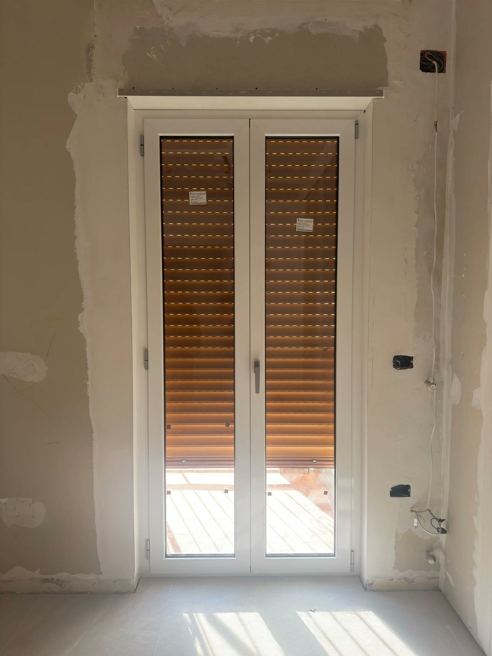 Porta-finestra con tapparelle